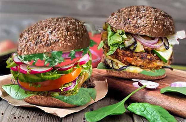 Two stacked homemade vegan burgers.