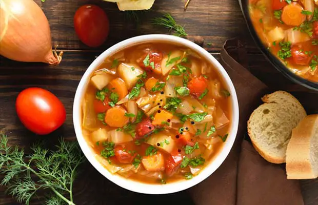 Huge bowl of chunky homemade vegetable soup. 