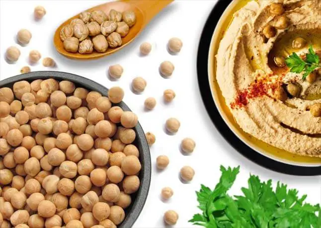 Bowls of chickpeas (garbanzo beans) and hummus. 