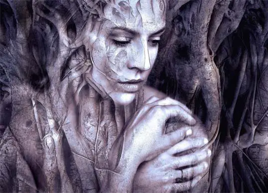 A piece of art showing a woman merged in the embrace of a tree. 