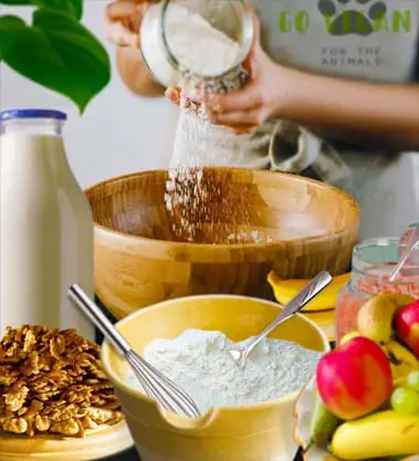 Girl pouring flour in a bowl while following a homemade pancakes recipe. 