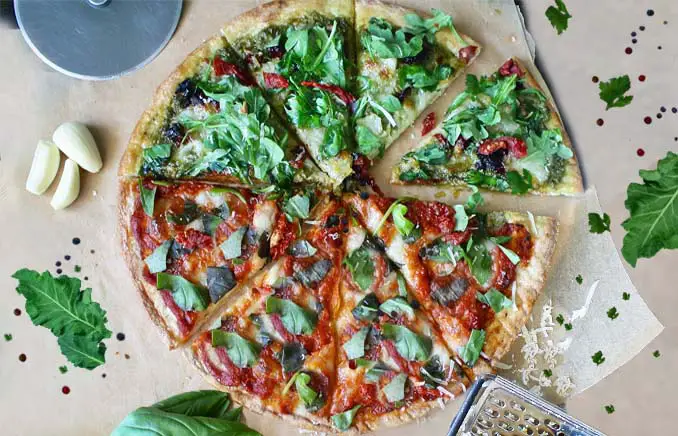 Top view of sliced vegan pizza.