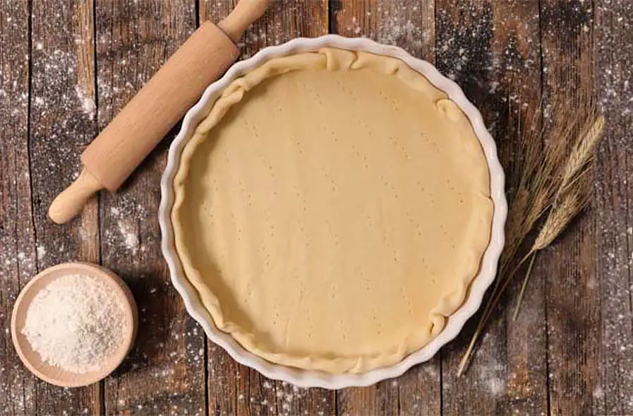 Top view of Himalayan Tartary Buckwheat pie crust on a wooden board. 